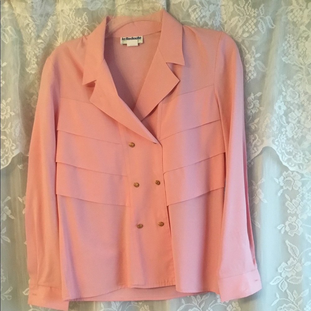Tailored pink blouse.